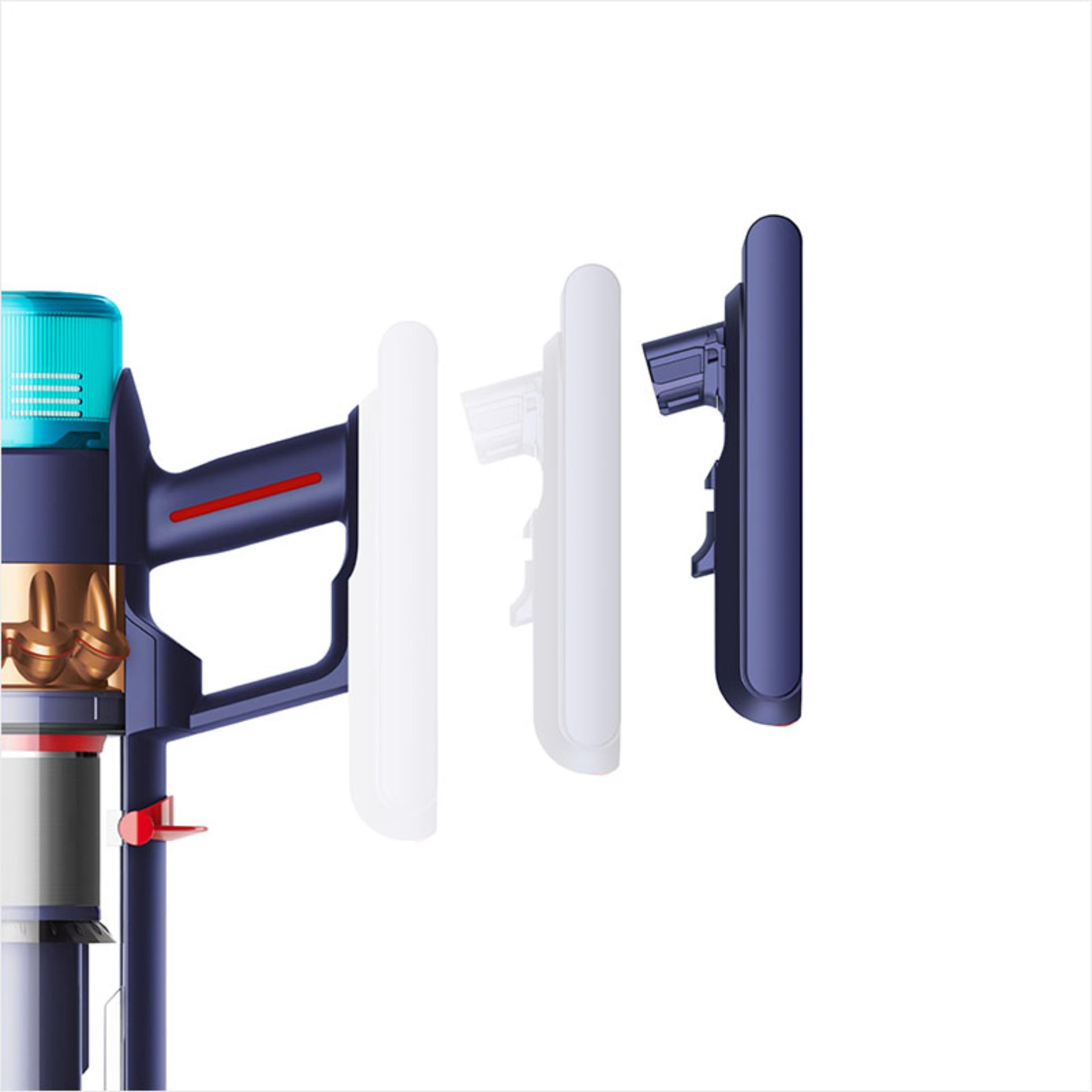 Dyson swappable battery clicking into the machine handle.