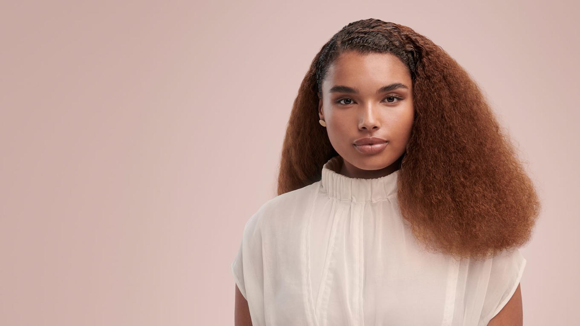 Model wearing a stretched blow out style