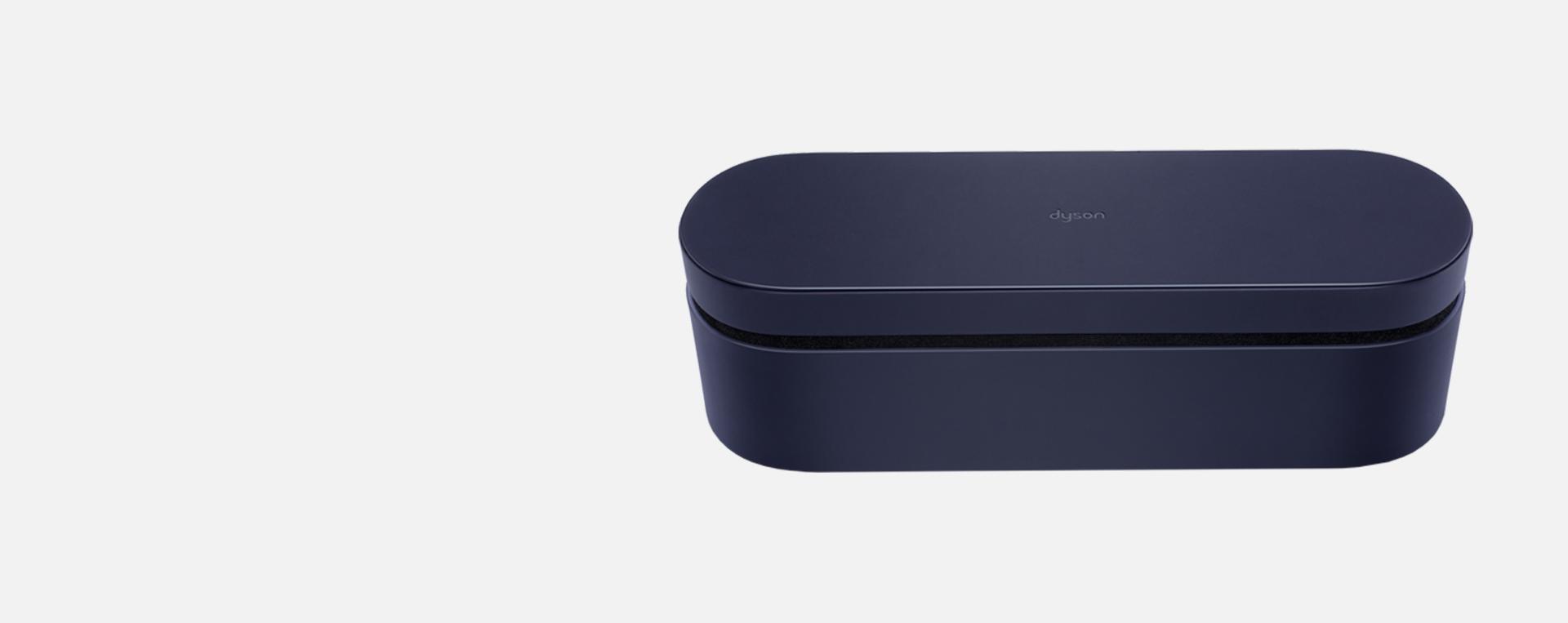 Dark blue Dyson-designed presentation case.