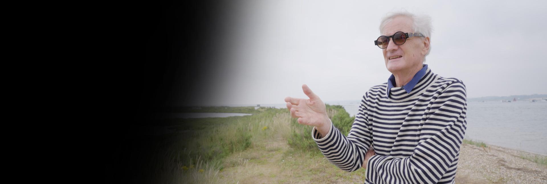 James Dyson stood explaining a story at Blakeney Point