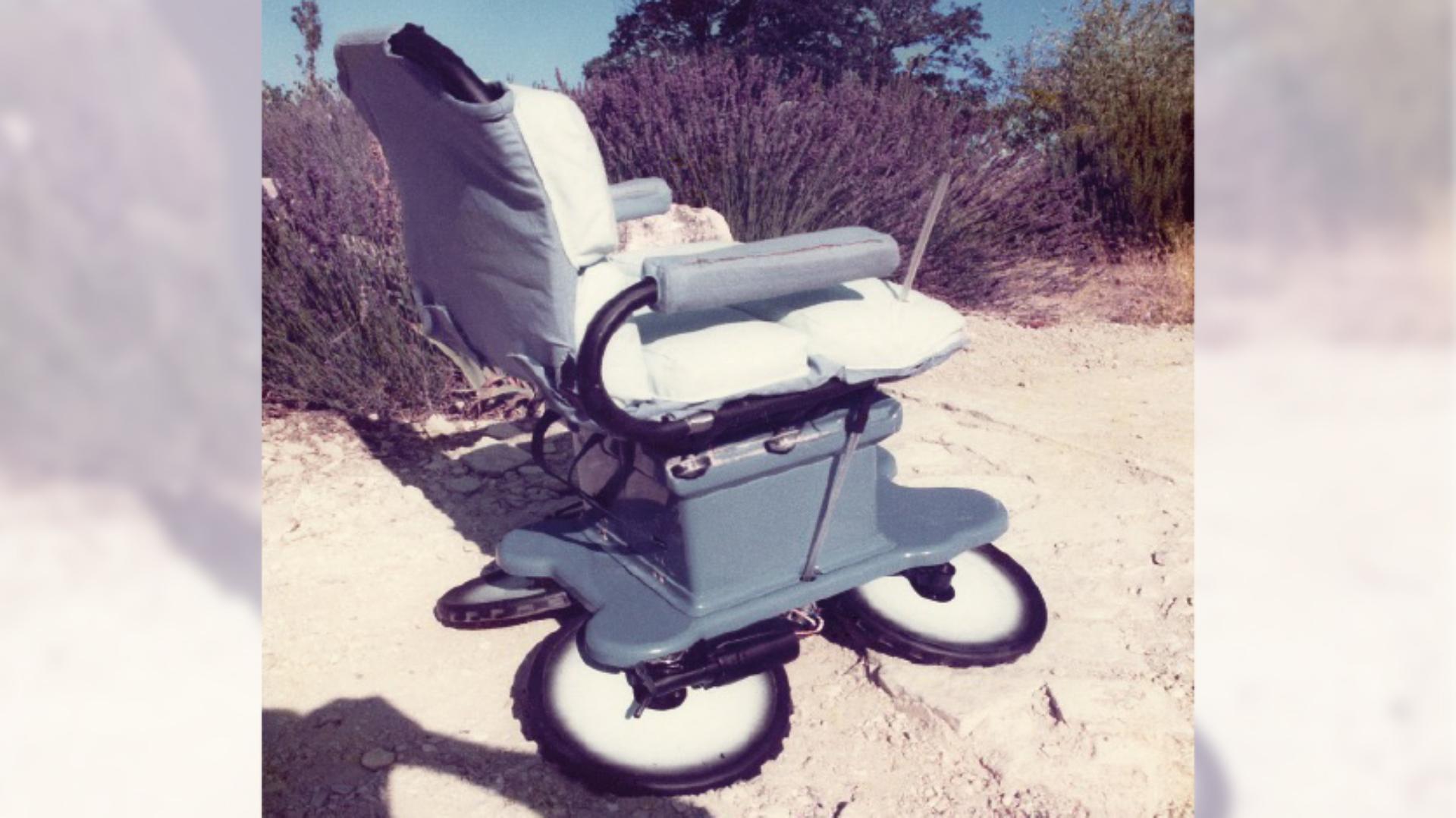 A large wheeled wheelchair