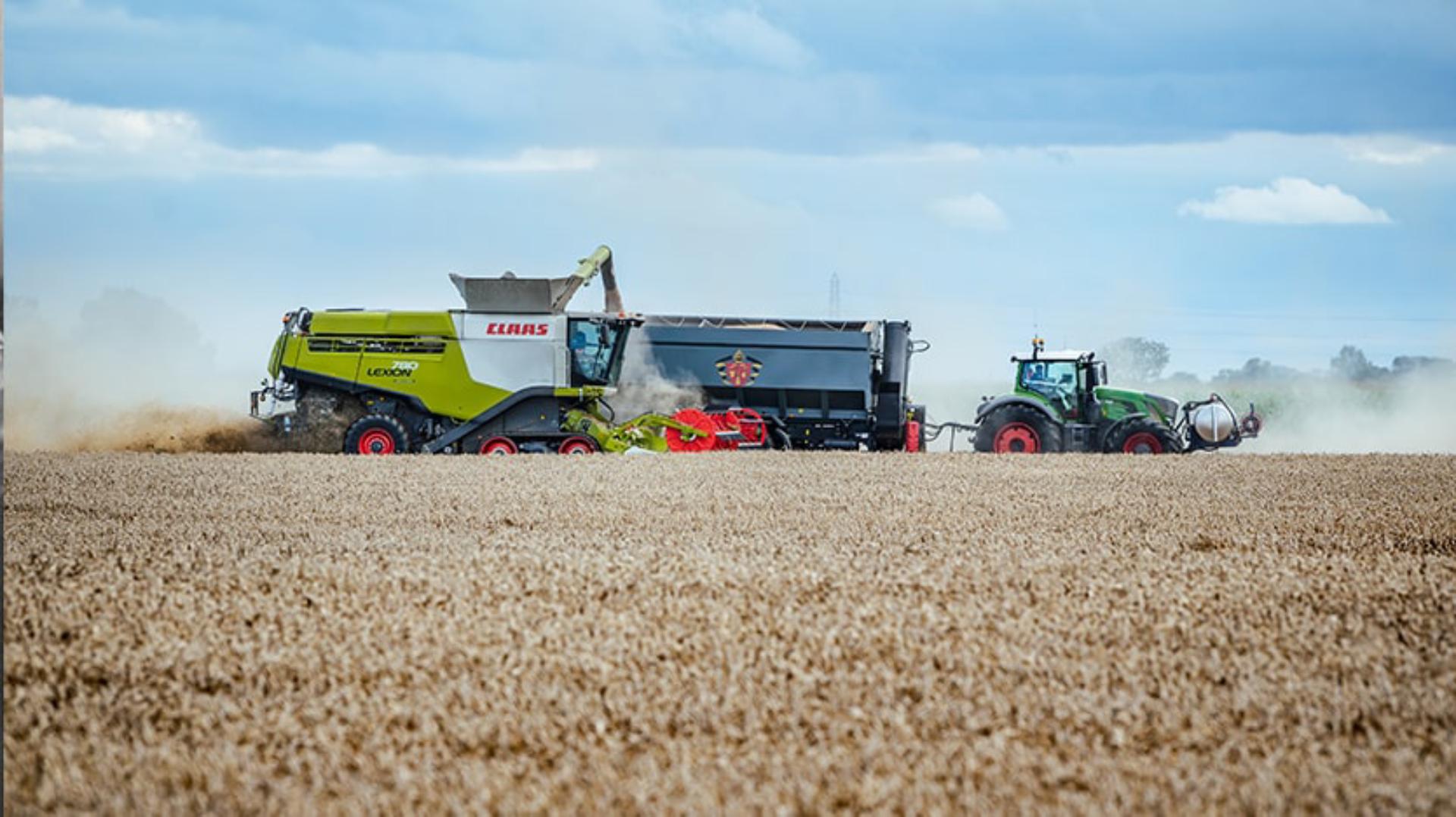 Side view of wheat being harvested