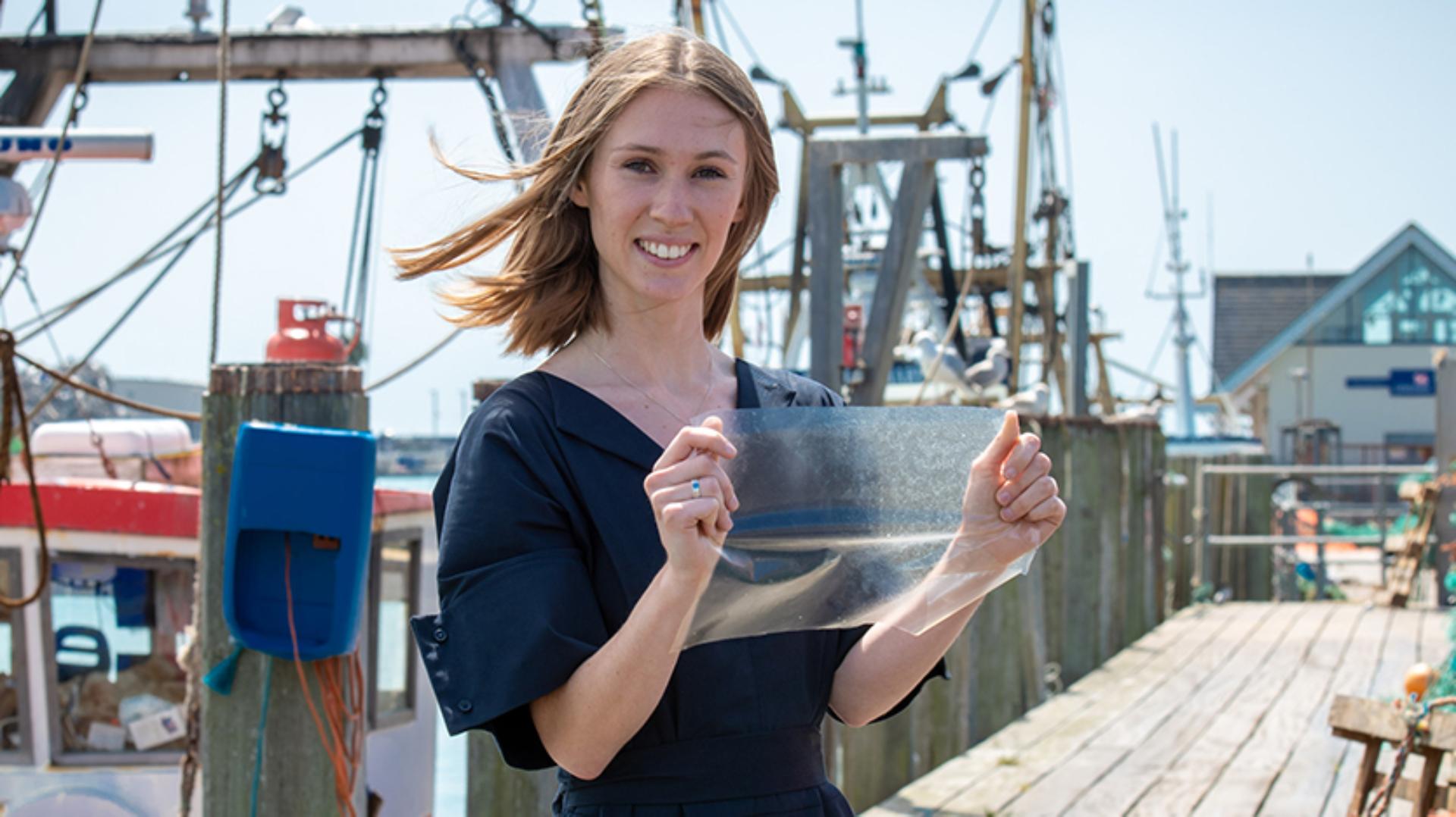 Lucy Hughes holding her MarinaTex entry