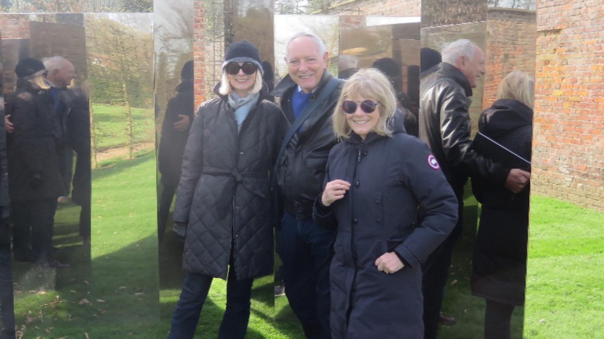 Deirdre Dyson standing with Chris and Diana Wilkinson