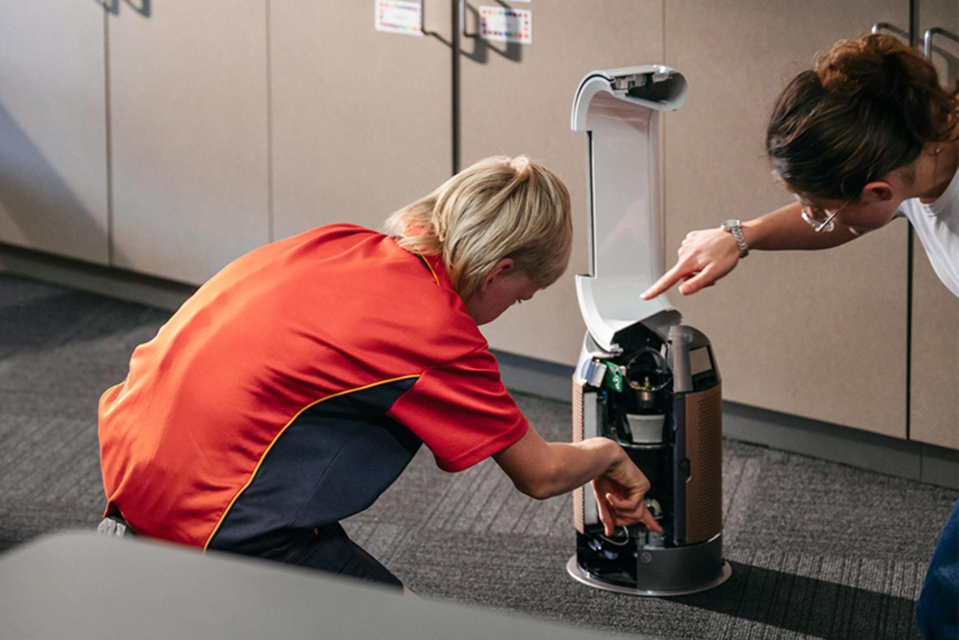 Student being shown a Dyson air purifier cut out