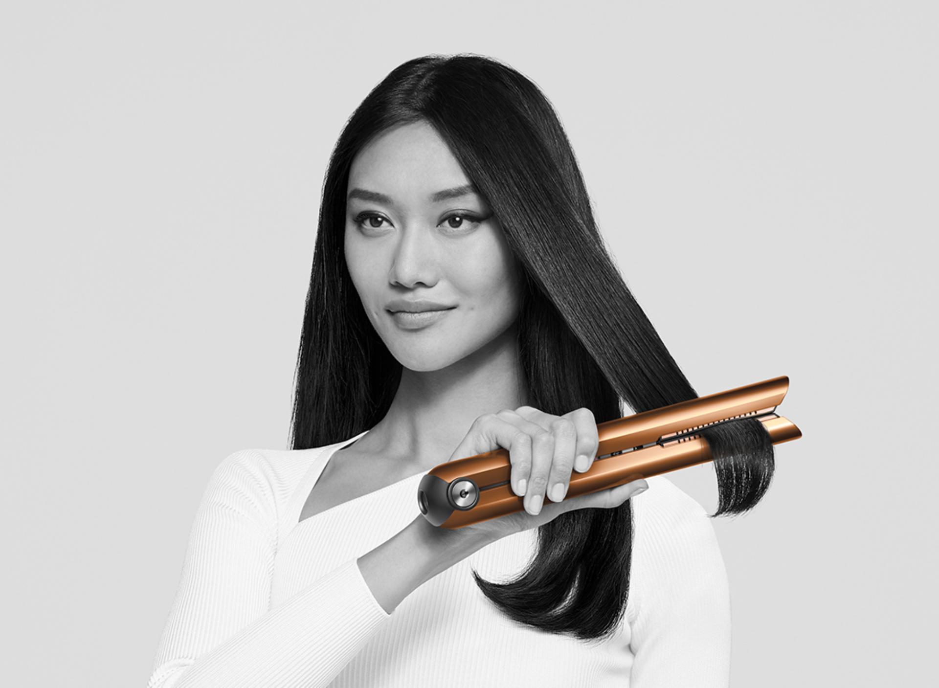 Model using Dyson Corrale straightener