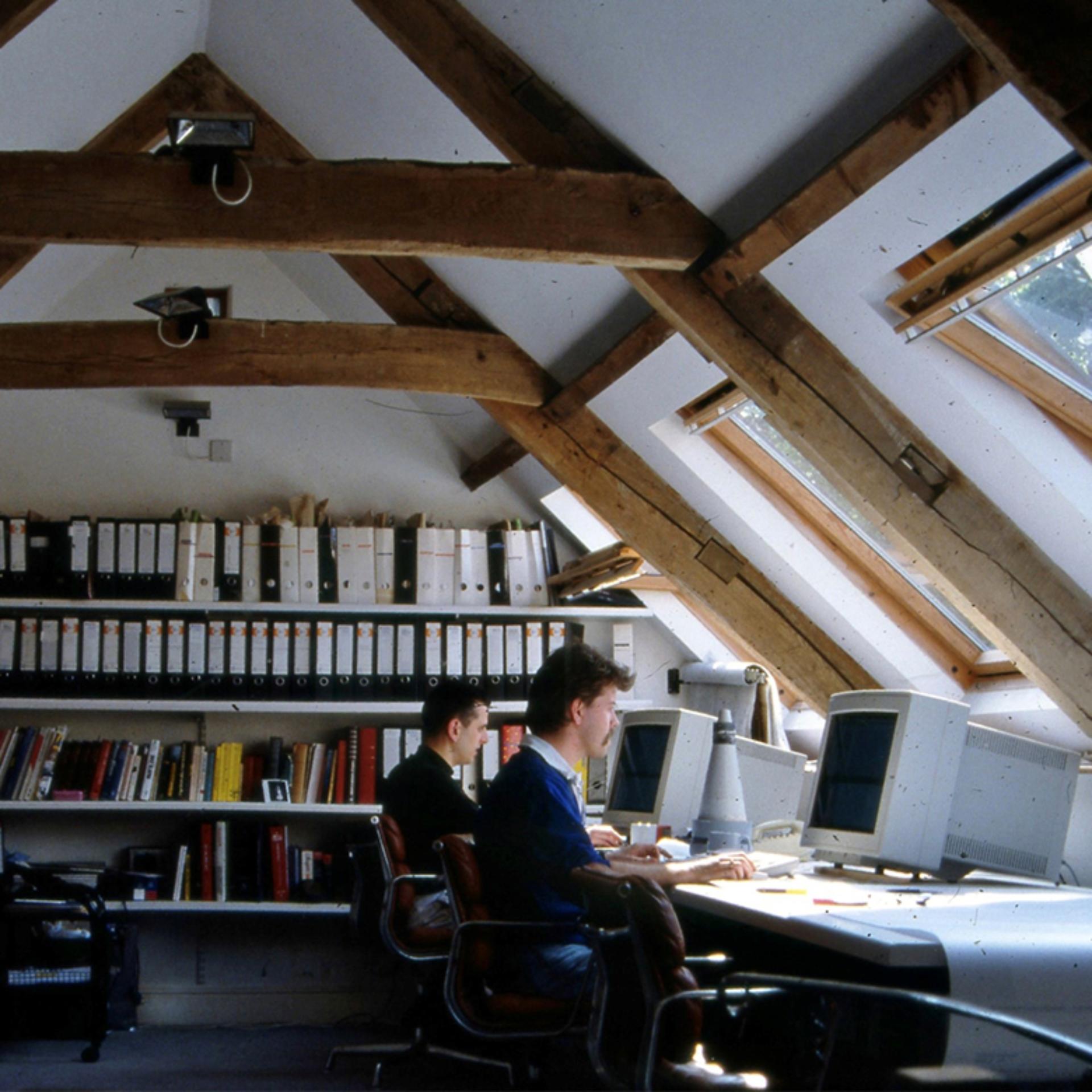 Working on computers inside the Coach House office