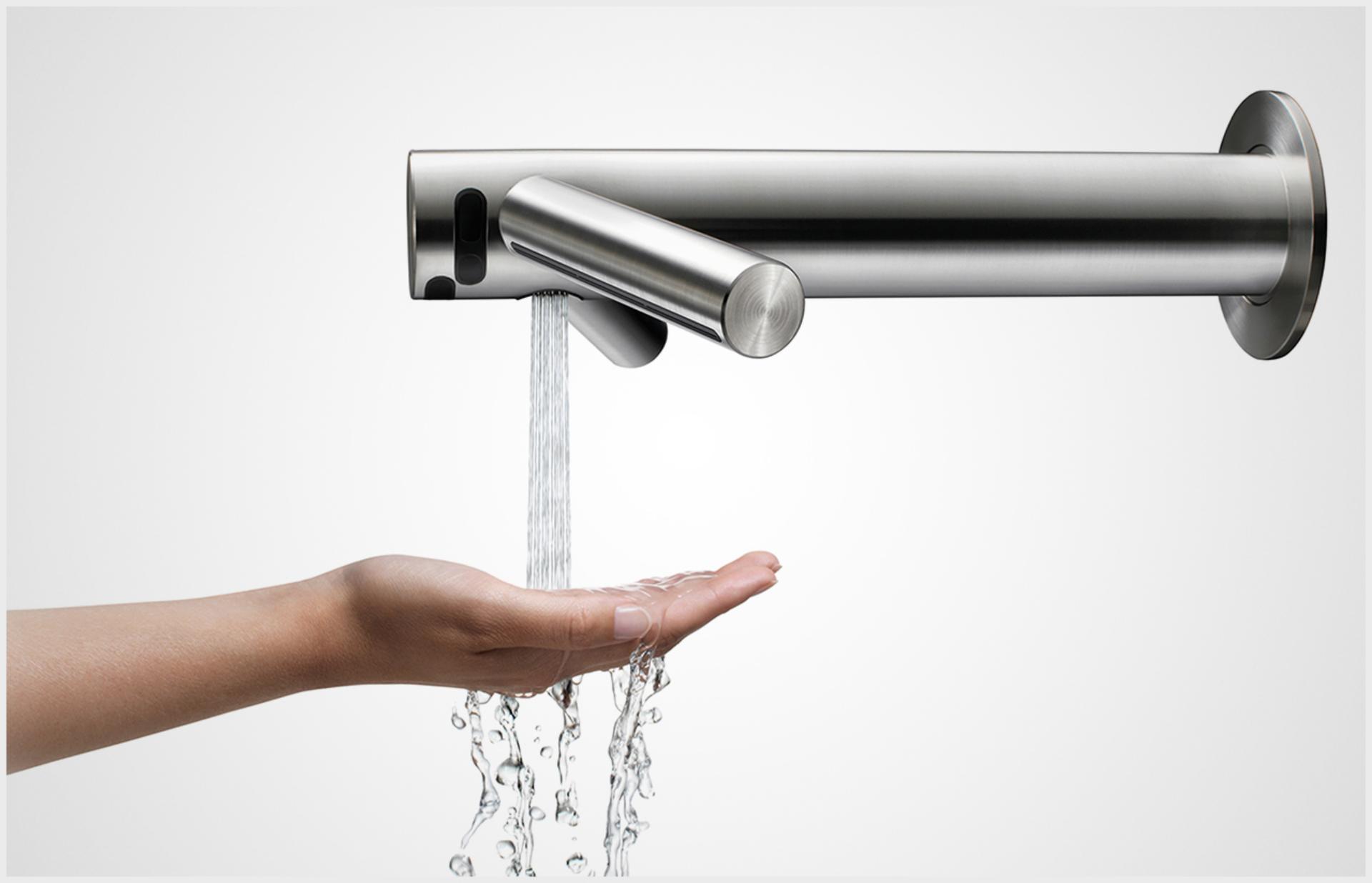 Dyson Airblade Wash+Dry washing hands in a sink